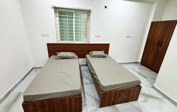 2-sharing non-AC room in Casavir PG Madhapur, large window, clean minimal design
